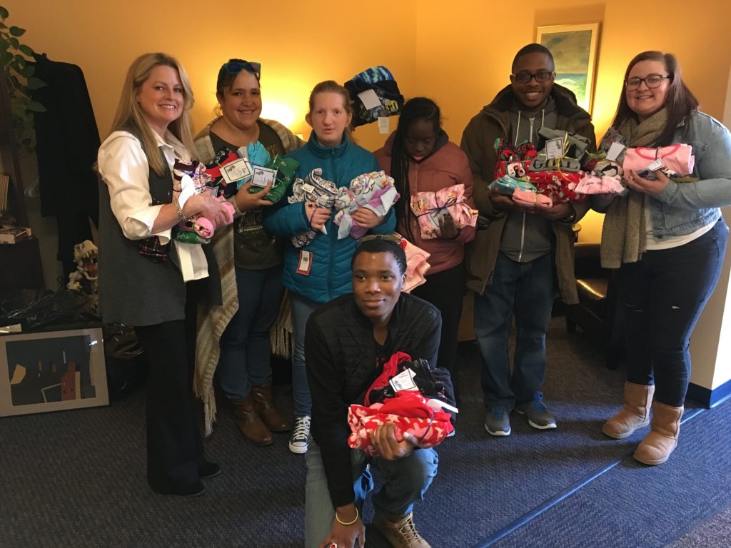 Inspire Shares Pajama Donation with Catholic Charities Catholic Charities